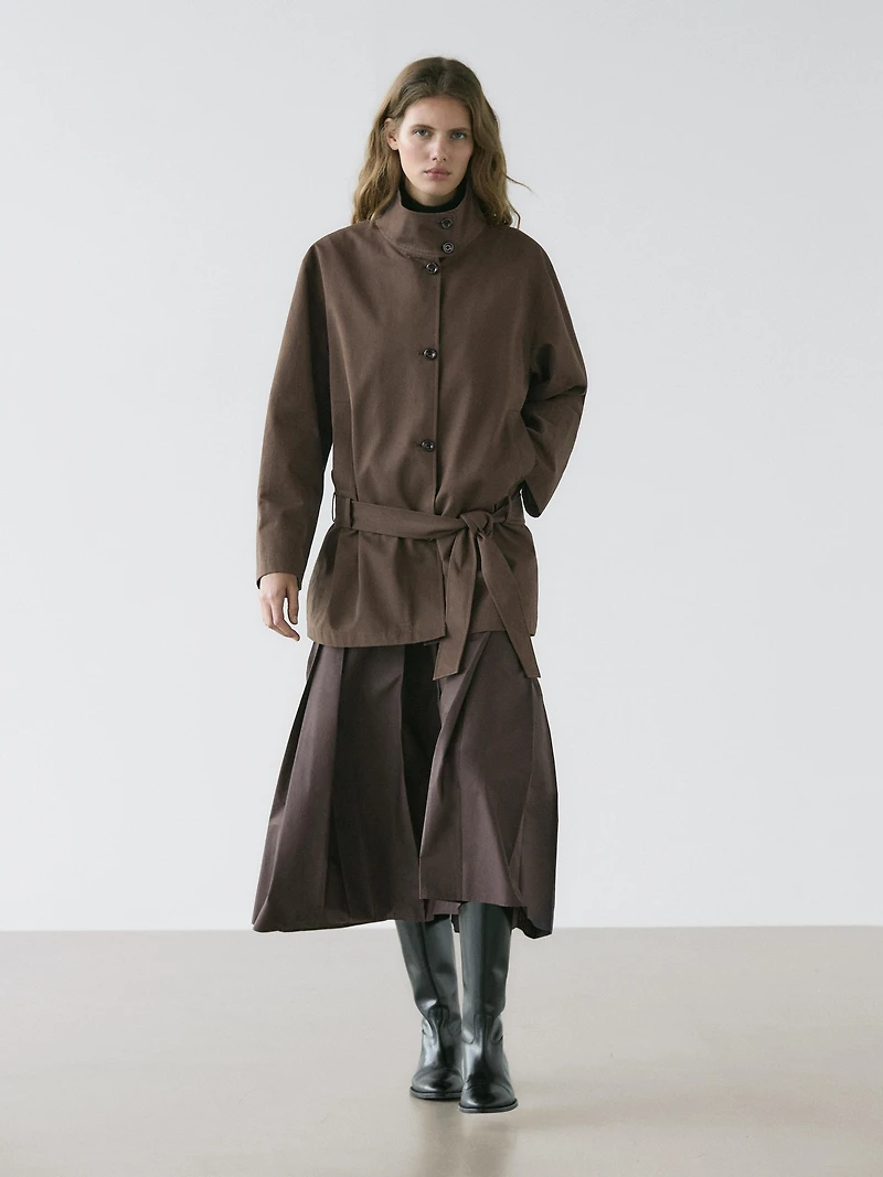 Mid-length trench coat with belt detail