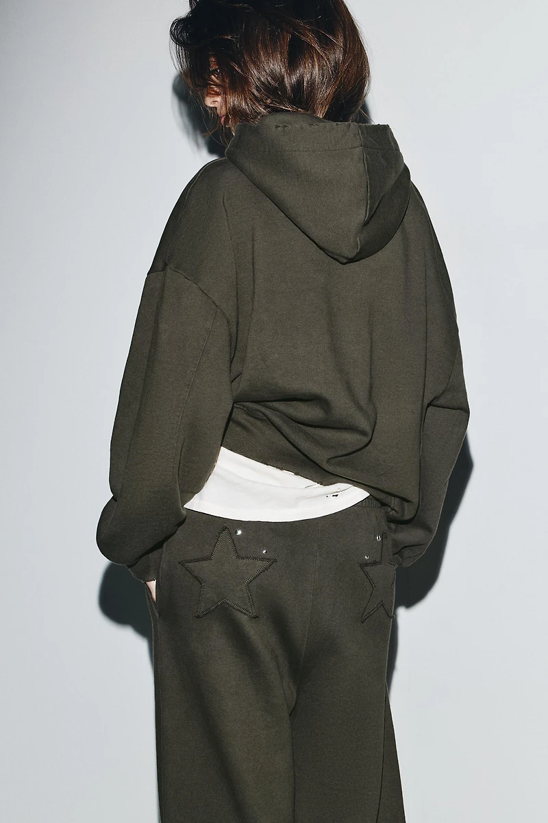 WASHED STAR STUD SWEATSHIRT