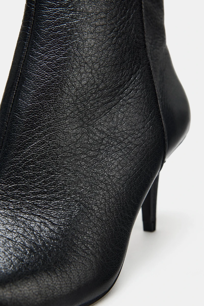 BOTTINES À TALONS EN CUIR