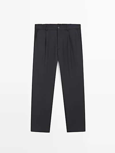 Relaxed fit darted wool blend trousers