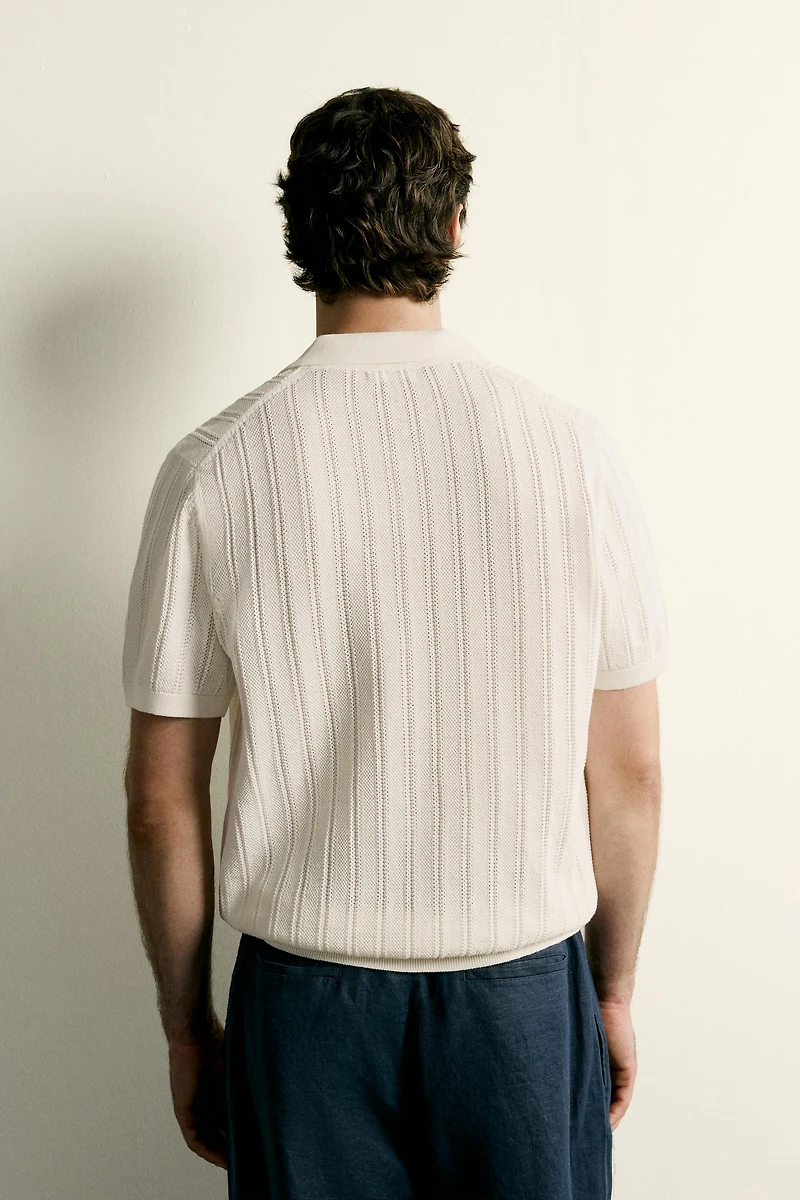 POLO EN MAILLE STRUCTURÉE AJOURÉE