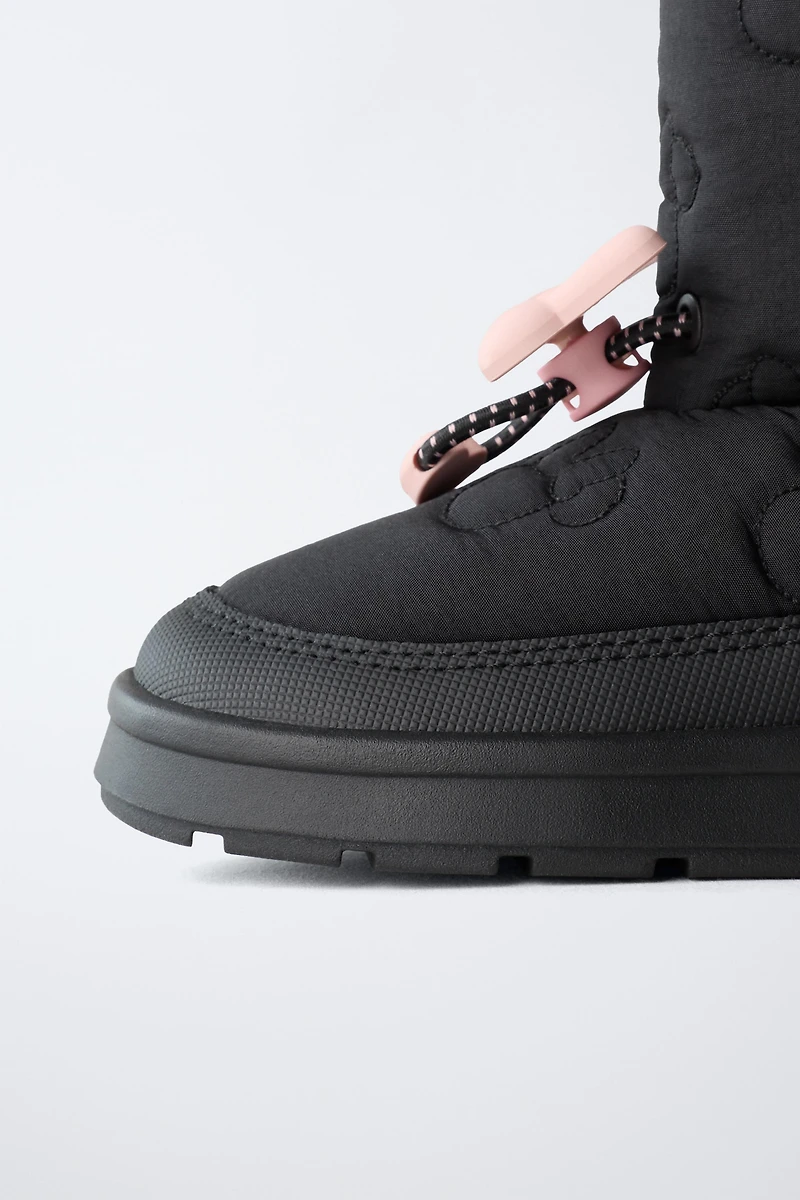 BOTTES DÉPERLANTES MINNIE MOUSE © DISNEY