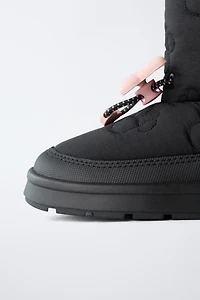 BOTTES DÉPERLANTES MINNIE MOUSE © DISNEY