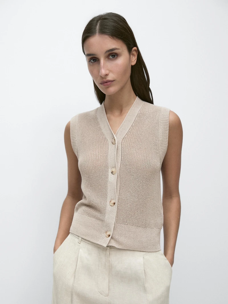 Knit vest with a high neck