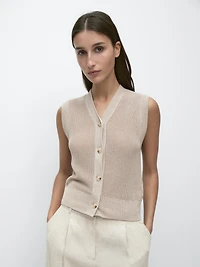 Knit vest with a high neck