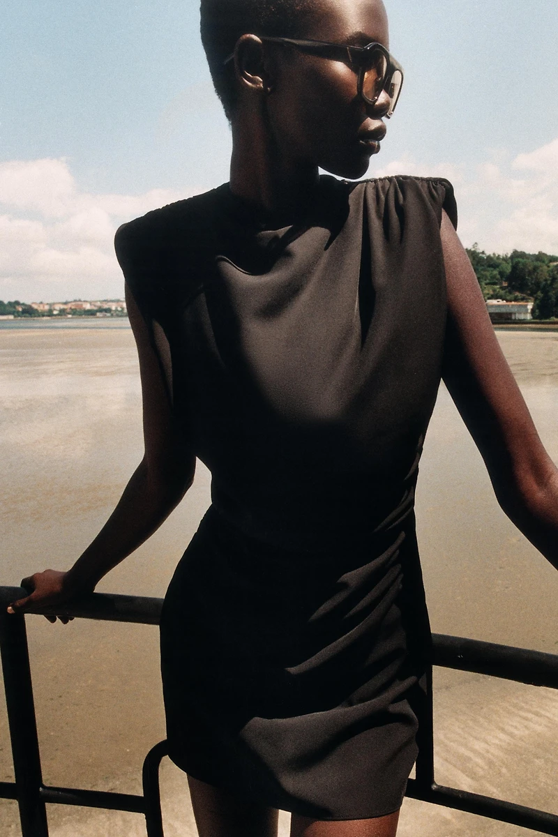 DRAPED MINI DRESS WITH SHOULDER PADS