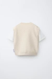 GILET EN TRICOT BRODÉ SNOOPY PEANUTS™