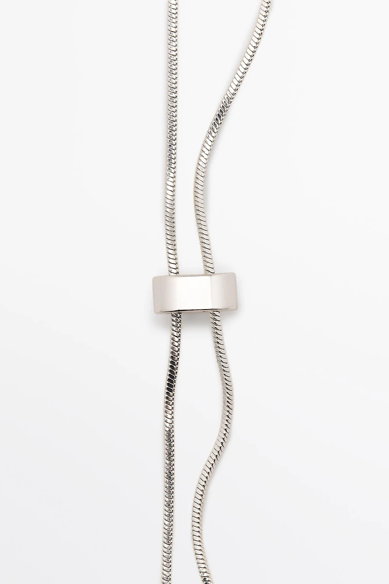 Collier pièces texturées réglable