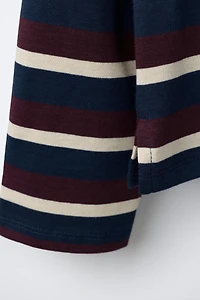 STRIPED STRANGER THINGS © NETFLIX POLO SHIRT