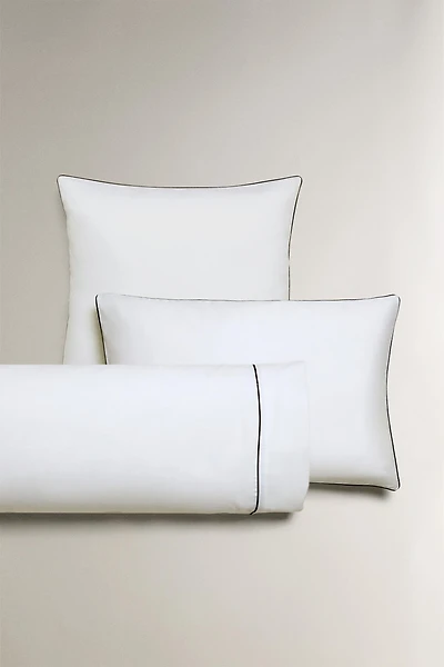 TAIE D’OREILLER SATIN PASSEPOIL