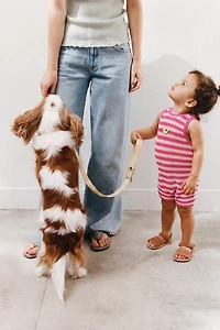 STRIPED KNIT OVERALLS WITH FLORAL PATCH