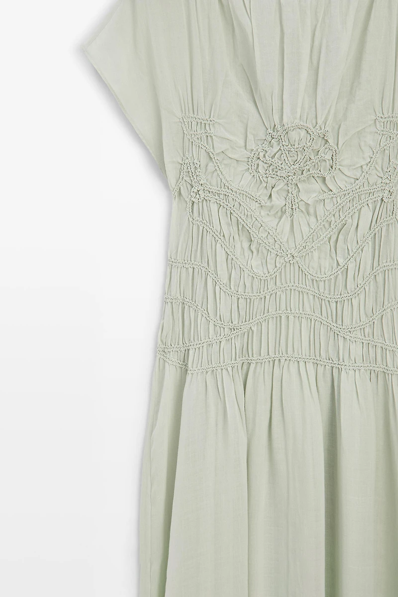 Long flowing dress with embroidered details