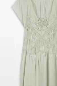 Long flowing dress with embroidered details