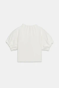 TOP EN MAILLE À FRONCES