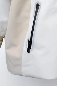 VESTE RÉSISTANTE À L'EAU ET COUPE-VENT COULEUR BLOCK