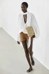 Shorts détail coutures cuir daim