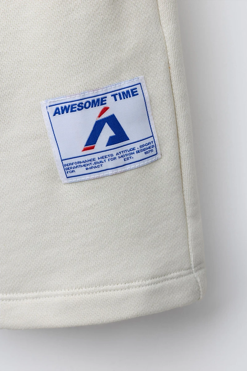 JOGGING SHORTS WITH LABEL