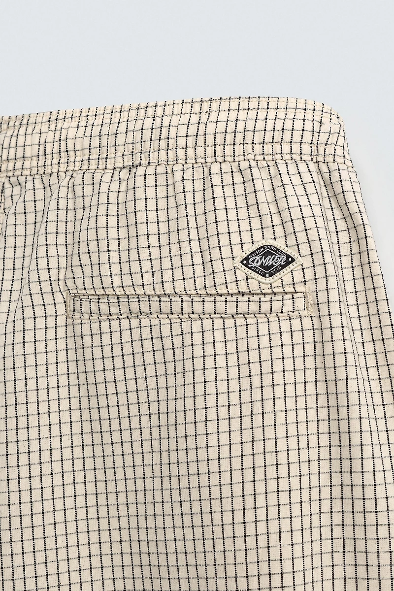 BALLOON FIT PLEATED PANTS