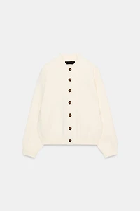 GILET EN MAILLE À BOUTON CONTRASTE