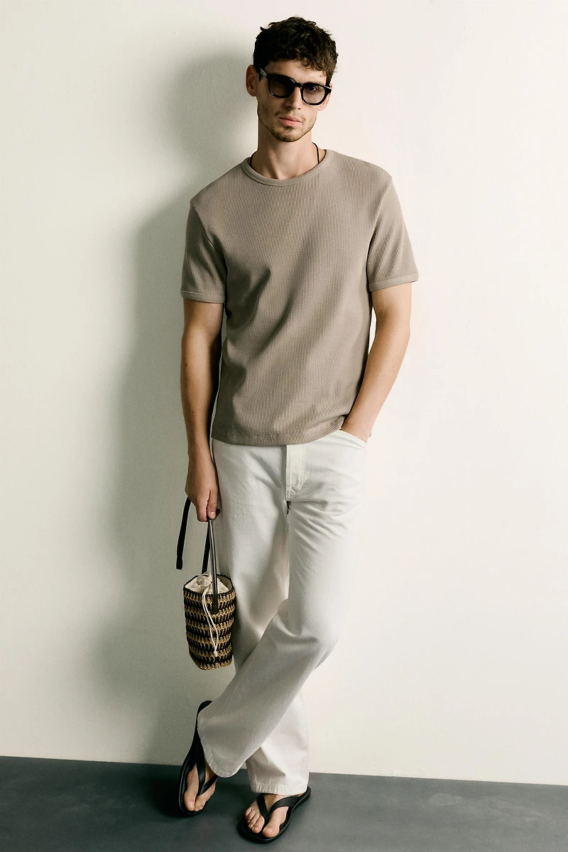 VERTICAL WOVEN CROSSBODY BAG