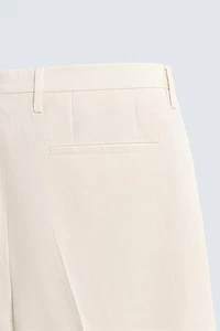 REGULAR FIT PLEATED PANTS
