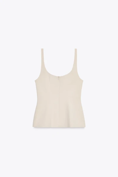 TOP PÉPLUM À ZIP