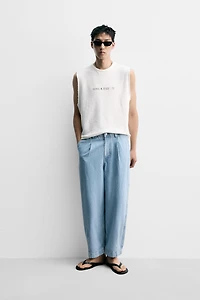 PLEATED WIDE FIT DENIM CHINO PANTS
