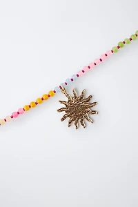 PACK OF TWO BEADED SUN NECKLACES