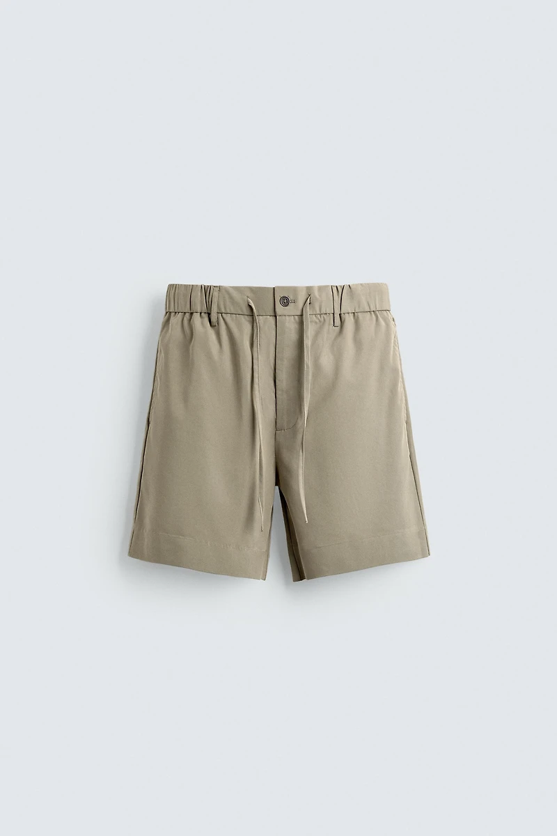 WASHED EFFECT RELAXED FIT SHORTS