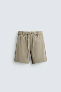 WASHED EFFECT RELAXED FIT SHORTS