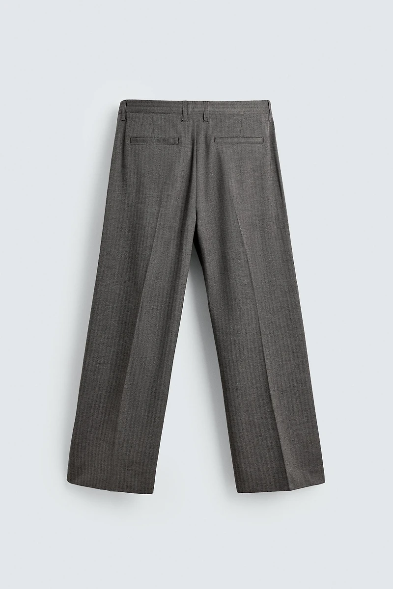 HERRINGBONE SUIT FLARE FIT PANTS