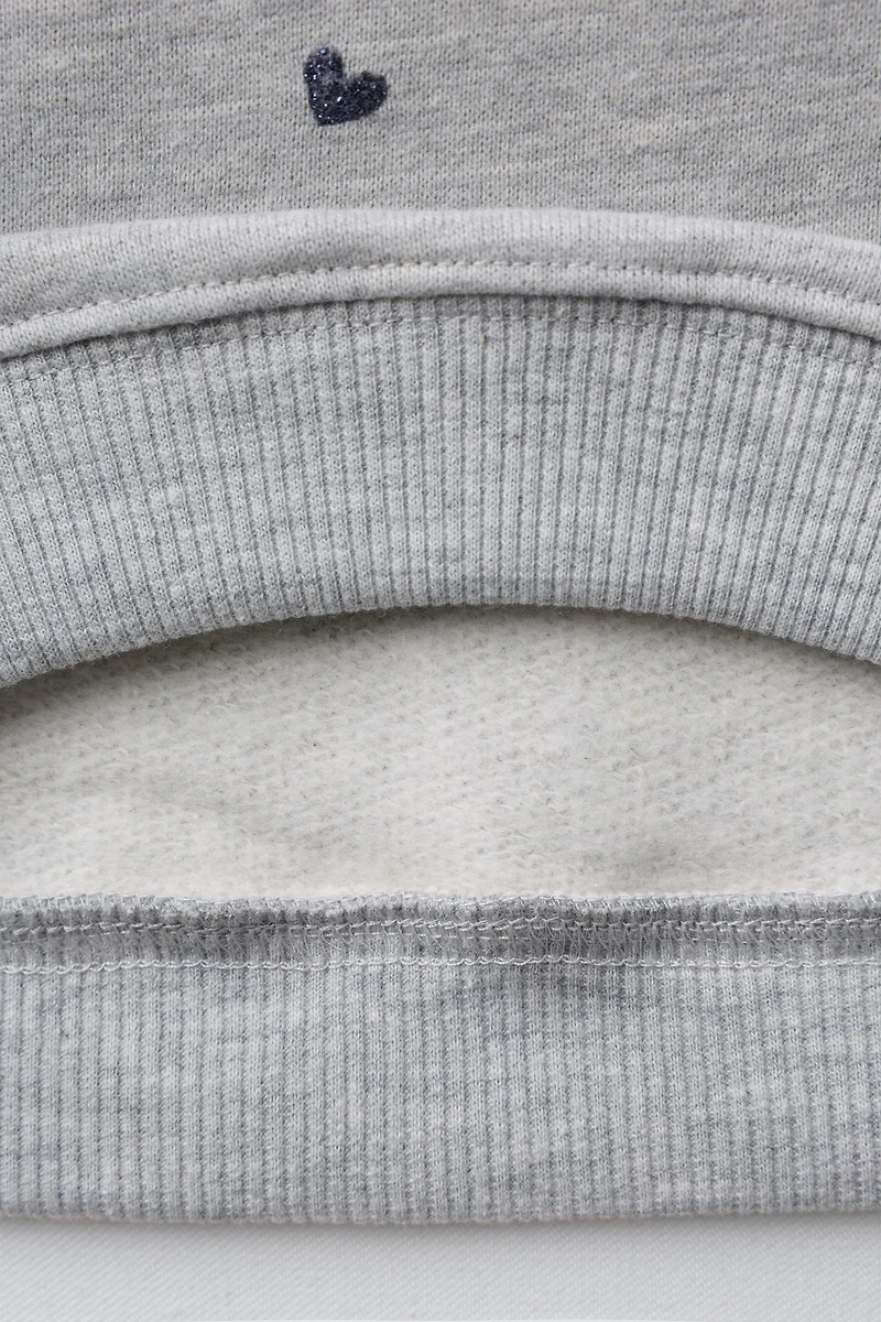 SWEAT À IMPRIMÉ BRILLANT