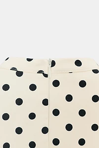 ROBE COURTE À NŒUD POIS