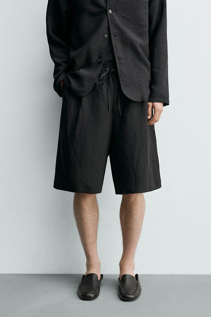 SHORT FLUIDE JACQUARD À RAYURES