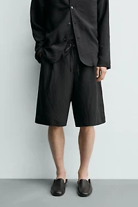 SHORT FLUIDE JACQUARD À RAYURES