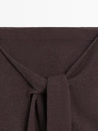 Jupe en maille à manches nouées