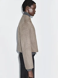 Manteau court finition brossée
