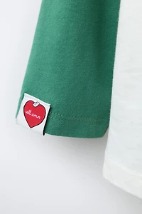 T-SHIRT MANCHES RAGLAN SNOOPY PEANUTS™