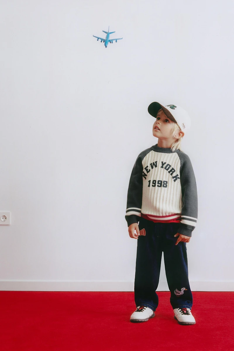 TEXTURED KNIT TEXT JUMPER