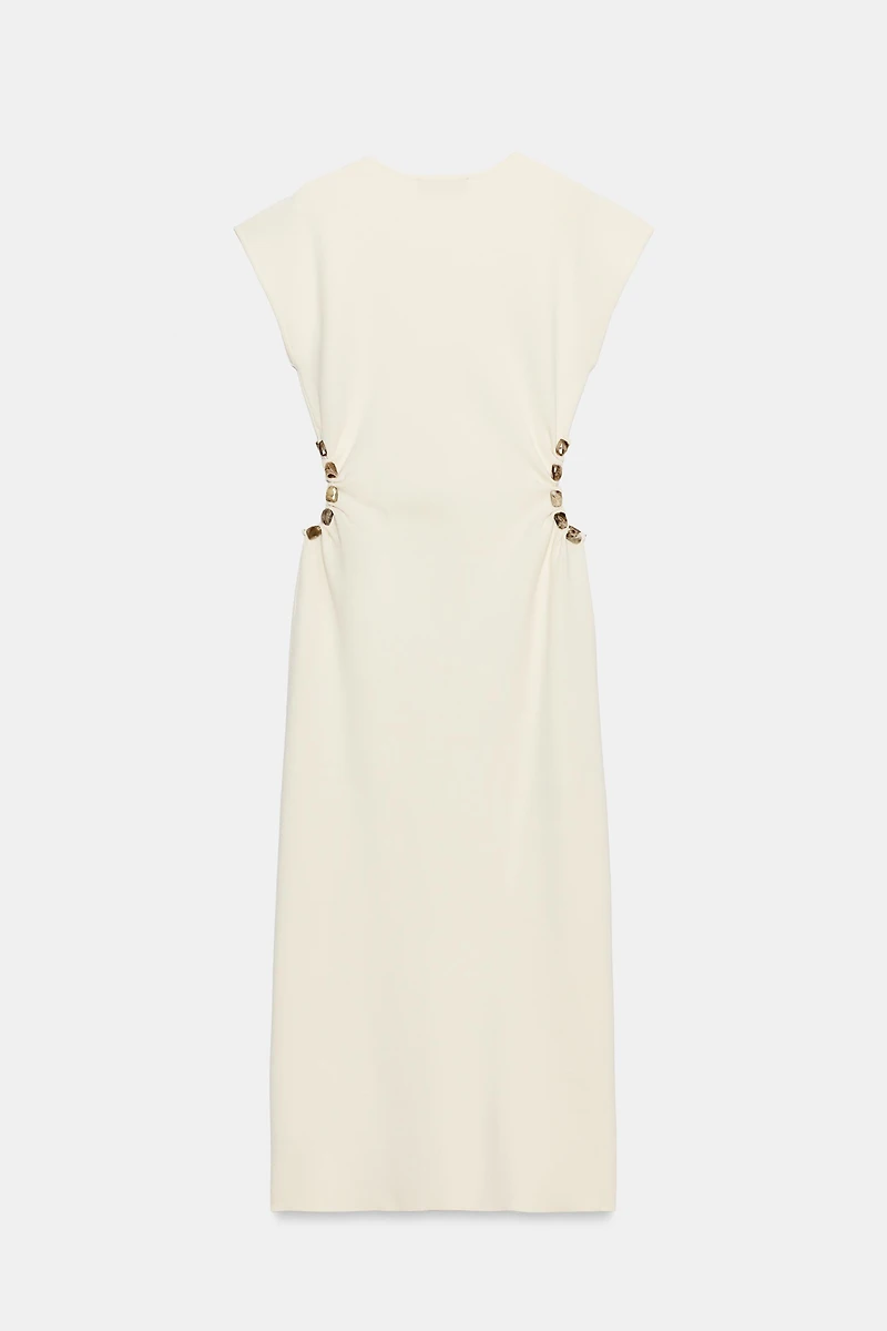 KNIT CUT OUT DRESS WITH BALLS