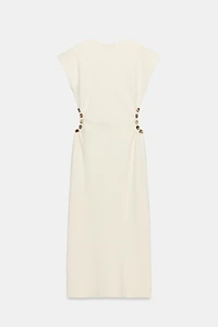 KNIT CUT OUT DRESS WITH BALLS