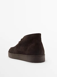 Chaussures montantes à bord mocassin