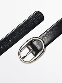 Leather belt with oval buckle