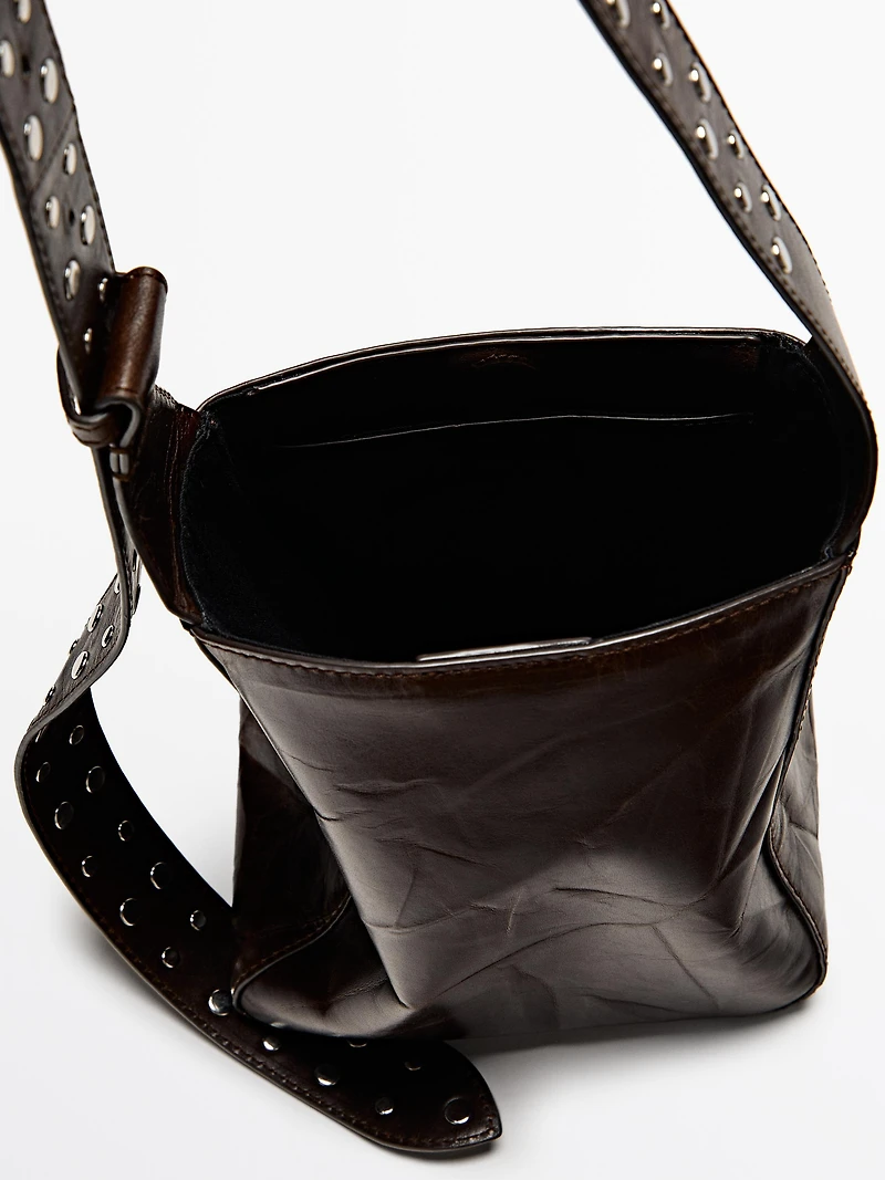 Nappa leather bucket bag with studs