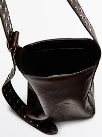 Nappa leather bucket bag with studs