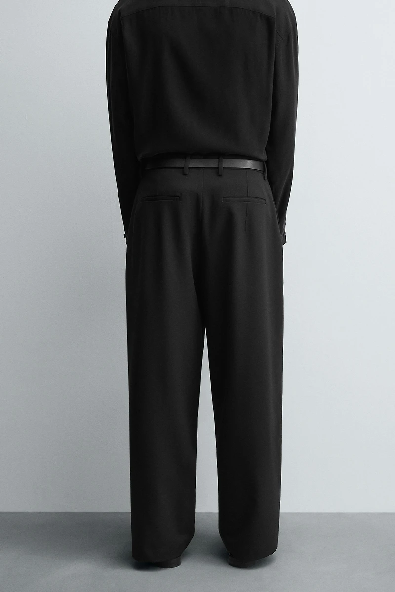 PLEATED WIDE FIT PANTS