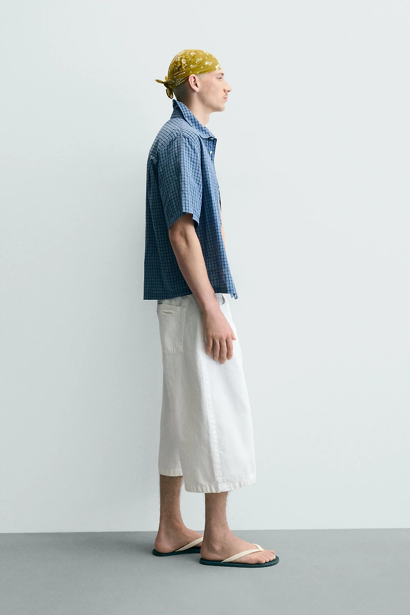 RIPPED RELAXED FIT DENIM JORTS