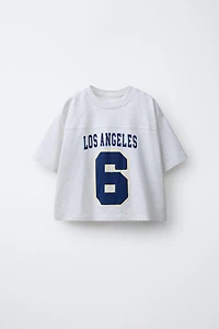 T-SHIRT VARSITY À NUMÉRO