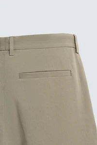 PLEATED STRAIGHT FIT PANTS