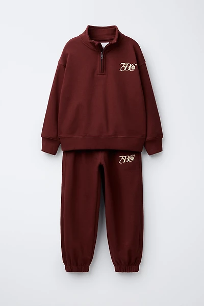 ENSEMBLE SWEAT ZIPPÉ ET PANTALON JOG TEXTE